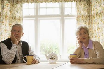 Social Security Divorce Benefits: 3 Things All Divorced Spouses Should Know: https://g.foolcdn.com/editorial/images/762023/senior-man-and-woman-sitting-at-table-resting-their-faces-on-their-hands-looking-bored-couple-retirement.jpg
