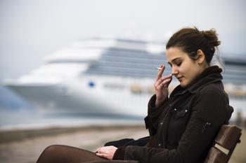 Why Norwegian Cruise Line Holdings Stock Was Tumbling This Week: https://g.foolcdn.com/editorial/images/775657/unhappy-person-smoking-while-seated-with-a-cruise-ship-in-the-background.jpg