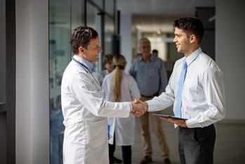 Is Doximity Stock a Buy Now?: https://g.foolcdn.com/editorial/images/736900/physician-shaking-patients-hand.jpg