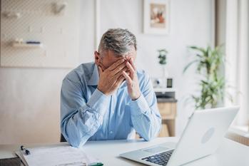 Worried About Paying for Healthcare in Retirement? Here Are Some Key Moves to Make.: https://g.foolcdn.com/editorial/images/734001/senior-man-laptop-covering-face-gettyimages-1472263927.jpg