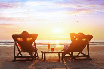 Delaying Social Security? Here's How Long It Could Take You to Break Even.: https://g.foolcdn.com/editorial/images/737440/mature-couple-relaxing-on-beach-at-sunset.jpg
