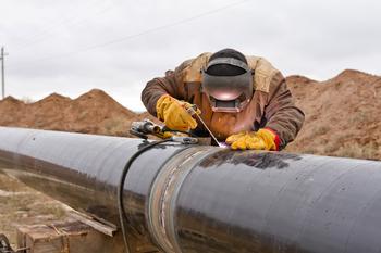 3 Ultra-High-Yield Dividend Stocks That Could Soar 32% to 55%, According to Wall Street: https://g.foolcdn.com/editorial/images/742908/pipeline-welder.jpg