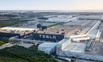 1 Electric Vehicle Stock to Consider Buying Now That Ford Just Pulled Back From EVs: https://g.foolcdn.com/editorial/images/845190/tesla-gigafactory-in-shanghai-with-tesla-logo.png