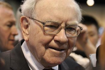 2 Warren Buffett Stocks That Could Go Parabolic: https://g.foolcdn.com/editorial/images/703488/warren-buffett-in-a-crowd-smiling.jpg
