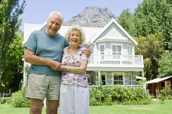 Could Downsizing Your Home Be Your Ticket to a Secure Retirement?: https://g.foolcdn.com/editorial/images/743250/senior-couple-outside-of-larger-home-gettyimages-89794602.jpg