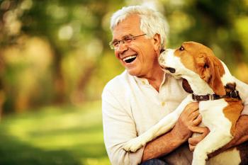 The Best Argument for Claiming Social Security at Age 70: https://g.foolcdn.com/editorial/images/735578/senior-man-smiling-being-licked-by-dog_gettyimages-500725657.jpg