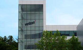 Should You Buy This Nearly 7%-Yielding Dow Jones Stock for Dividend Income?: https://g.foolcdn.com/editorial/images/840285/building-with-verizon-logo-on-side_verizon.jpg