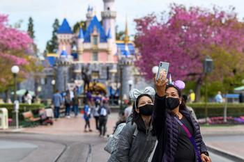 Disney to Cut 7,000 Jobs. Here's What the Company's Plans Mean for Investors: https://g.foolcdn.com/editorial/images/720029/tourists-at-disneyland-taking-a-photo-in-front-of-sleeping-beauty-castle.jpg
