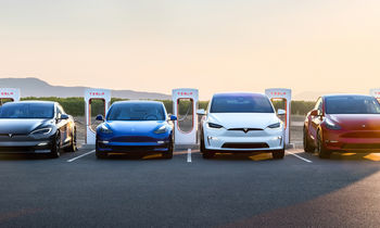 Better Electric Vehicle (EV) Stock: Ford vs. Tesla: https://g.foolcdn.com/editorial/images/842548/4-teslas-in-a-line-at-a-charging-station.png