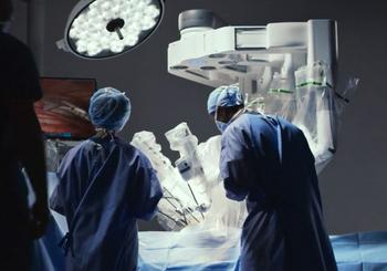 Why Intuitive Surgical Stock Is Skyrocketing Today: https://g.foolcdn.com/editorial/images/839307/intuitive-da-vinci-or-staff-with-patient-cart-lo-res.jpg