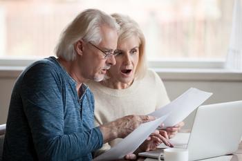 3 Ways You Could Lose Some of Your Social Security Benefits: https://g.foolcdn.com/editorial/images/761133/getty-images-older-couple-shocked-by-a-bill-gettyimages.jpg