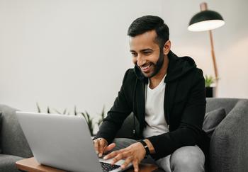 3 No-Brainer Stocks to Buy for Under $100 Right Now: https://g.foolcdn.com/editorial/images/733981/person-smiling-and-looking-at-laptop.jpg
