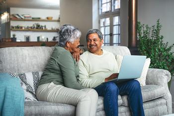 Social Security COLA: 3 Things All Retirees Need to Know for 2023: https://g.foolcdn.com/editorial/images/697384/two-older-people-sitting-on-a-couch-using-a-laptop-and-smiling.jpg
