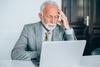 Will Age Discrimination Get in the Way of Your Retirement Plans?: https://g.foolcdn.com/editorial/images/744675/senior-man-suit-laptop-stress-gettyimages-1186388803.jpg