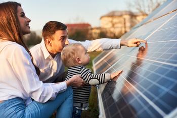 Why Solar Stocks Like Sunrun and Sunnova Energy Were Glowing Today: https://g.foolcdn.com/editorial/images/740162/two-adults-and-a-baby-touching-a-solar-panel-array.jpg