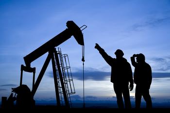 ExxonMobil Is Cashing In on Higher Crude Oil Prices: https://g.foolcdn.com/editorial/images/752643/the-silhouette-of-some-people-pointing-to-an-oil-well.jpg