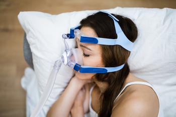 Why Shares of Koninklijke Philips Are Falling on Friday: https://g.foolcdn.com/editorial/images/750079/woman-sleeps-with-cpap-machine-sleep-apnea.jpg