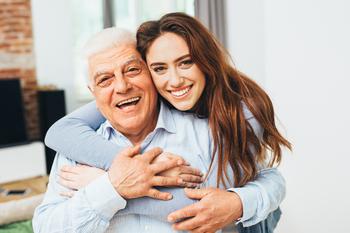 Here's Why I'm Pushing My 70-Year-Old Father to Keep Working: https://g.foolcdn.com/editorial/images/731059/two-smiling-people-with-arms-around-each-other-gettyimages-521267648.jpg
