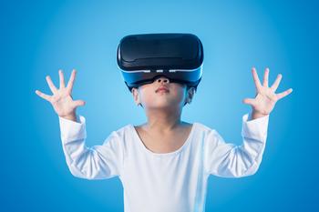 Does Meta Have a Chance Against Apple in VR?: https://g.foolcdn.com/editorial/images/737763/kid-with-vr-headset.jpg