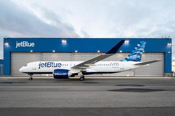 Why JetBlue Stock Is Soaring and Spirit Airlines Is Plummeting Today: https://g.foolcdn.com/editorial/images/761507/jblu-a220-source-jblu.jpg