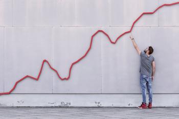 Why This Tech Stock Could Take Off This Earnings Season: https://g.foolcdn.com/editorial/images/690766/man-pointing-upward-toward-a-rising-red-line-on-a-wall.jpg