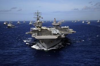 Huntington Ingalls Plans to Buy Back $3.8 Billion of Its Shares. Should You Buy Too?: https://g.foolcdn.com/editorial/images/764298/carrier-strike-group-spearheaded-by-uss-ronald-reagan-at-sea.jpg