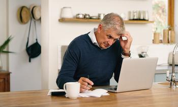 64% of Americans Worry a Major Recession Is Imminent. Do This If You Feel the Same and Are Retiring Within 2 Years: https://g.foolcdn.com/editorial/images/740085/older-man-laptop-gettyimages-1399376472.jpg