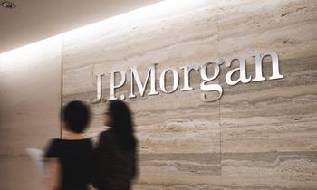 JPMorgan Chase: Buy, Sell, or Hold?: https://g.foolcdn.com/editorial/images/778153/inside-jpmorgan-office-with-jpmorgan-logo-on-wall-while-two-people-walk-by_jpmorgan.jpg