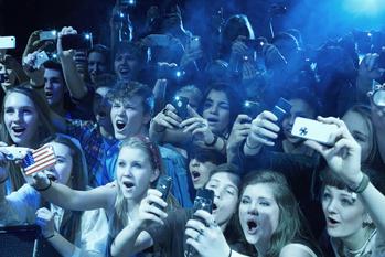Why Eventbrite Stock Was Climbing Today: https://g.foolcdn.com/editorial/images/722964/fans-at-a-concert-screaming-enthusiastic-phones.jpg