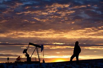 3 No-Brainer Oil Stocks to Buy in September: https://g.foolcdn.com/editorial/images/699906/a-person-looking-at-an-oil-pump-with-the-sun-setting-in-the-background.jpg