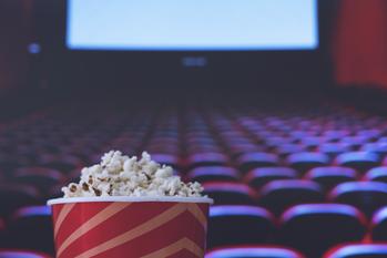 Why Imax Stock Blasted Nearly 6% Higher on Thursday: https://g.foolcdn.com/editorial/images/739729/bucket-of-popcorn-in-the-foregound-of-a-movie-theater.jpg