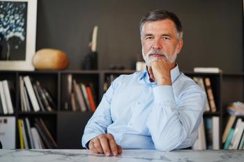 Will a $1 Million Nest Egg Leave You Short on Funds in Retirement?: https://g.foolcdn.com/editorial/images/750157/man-50s-desk-gettyimages-1366936744.jpg