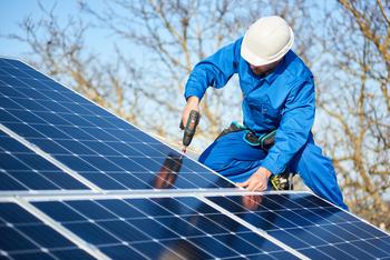 Why SunPower Stock Popped 10% on Wednesday: https://g.foolcdn.com/editorial/images/739534/worker-in-blue-jumpsuit-and-white-hardhat-installs-solar-panels-on-a-rooftop.jpg