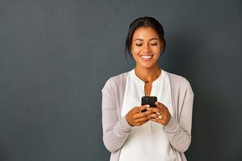 2 Smart Stocks to Buy and Hold for Years: https://g.foolcdn.com/editorial/images/719674/getty-happy-smiling-person-looking-at-phone.jpg