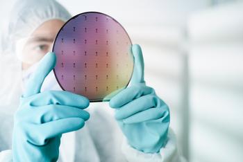 Could Canon Become the Next ASML?: https://g.foolcdn.com/editorial/images/751094/man-chip-wafer.jpg