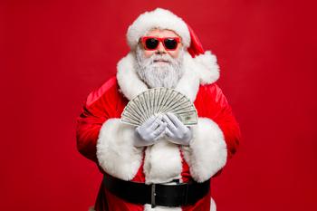 3 Hot Tech Stocks That Could Make You Richer in December (and Beyond): https://g.foolcdn.com/editorial/images/757792/santa-holding-cash.jpg