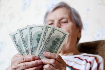 Social Security's 2024 COLA Is Shaping Up to Be a Good News/Bad News Scenario: https://g.foolcdn.com/editorial/images/740358/elderly-woman-retirement-social-security-holding-one-hundred-dollar-bills-cash-getty.jpg