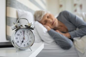 The Medicare Enrollment Clock Is Ticking: 3 Important Things Every Senior Needs to Know: https://g.foolcdn.com/editorial/images/752731/retired-woman-sleeping-alarm-clock.jpg