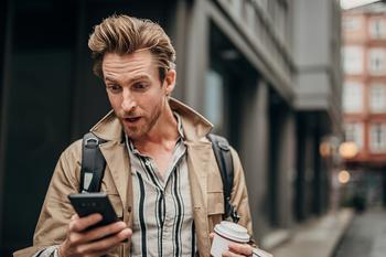 2 Best Stocks to Invest $5,000 in Before the End of 2022: https://g.foolcdn.com/editorial/images/714377/surprised-man-using-phone-on-the-street-in-city.jpg