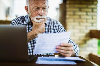 These 2 Social Security Mistakes Could Leave You Regretting Your Filing Decision: https://g.foolcdn.com/editorial/images/746939/older-man-serious-looking-at-document_gettyimages-1345284718.jpg