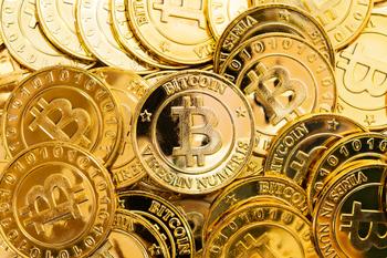 Bitcoin: Bull vs. Bear: https://g.foolcdn.com/editorial/images/745776/gold-coins-with-bitcoin-logo-on-them.jpg