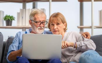 Claiming Social Security at 62? Here Are 3 Reasons You Might Take Home Less Than You Expected: https://g.foolcdn.com/editorial/images/765028/perplexed-senior-couple-looking-at-laptop.jpg