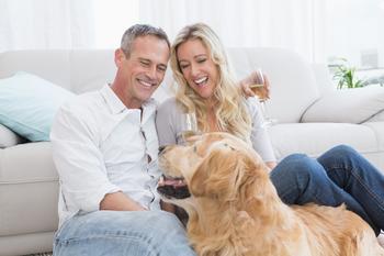 Why Chewy Stock Is Falling 11% This Week: https://g.foolcdn.com/editorial/images/722222/couple-dog-living-room-wine-luxury-getty.jpeg