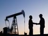 Beyond Higher Oil Prices, Oil Stocks See This Catalyst Fueling Growth in 2023: https://g.foolcdn.com/editorial/images/709863/the-silhouette-of-two-people-shaking-hands-near-an-oil-pump.jpg