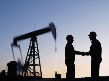 Occidental Petroleum Could Soon Follow Exxon and Chevron by Making a Needle-Moving Acquisition: https://g.foolcdn.com/editorial/images/756649/the-silhouette-of-two-people-shaking-hands-near-an-oil-pump.jpg