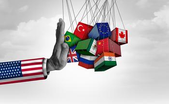 Is IBM's Stock at Risk for a Tariff Downturn?: https://g.foolcdn.com/editorial/images/838332/american-hand-blocking-international-trade-containers-2206281674.jpg