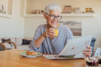 I'm Single. What Should My Social Security Filing Strategy Look Like?: https://g.foolcdn.com/editorial/images/731729/older-woman-newspaper-gettyimages-1037623330.jpg