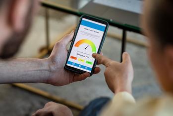 My Credit Score Dropped Nearly 50 Points -- And I'm OK With It: https://g.foolcdn.com/editorial/images/720535/credit-score-on-cell-phone-gettyimages-1406046205-smaller.jpg