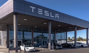 Massive News for Tesla Stock Investors: https://g.foolcdn.com/editorial/images/754205/tesla-sales-building-with-tesla-logo-and-teslas-parked-in-front.png