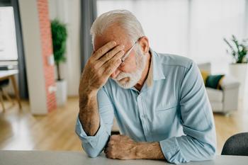 Should You Postpone Your Retirement Plans If a Recession Hits in 2024?: https://g.foolcdn.com/editorial/images/760543/older-man-holding-head-gettyimages-1302874070.jpg